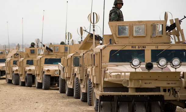 A convoy of Afghan National Army HMMWVs line up in formation at the Kabul Military Training Center  in Kabul, Afghanistan. (AP/U.S. Navy, Petty Officer 2nd Class Ernesto Hernandez Fonte)