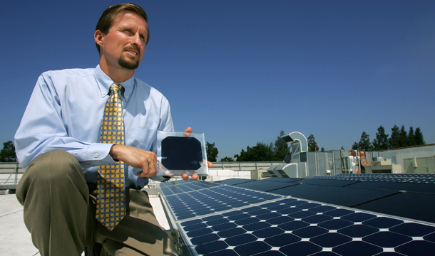 SunPower Corp. CEO Thomas Werner holds a solar panel next to the panels on the roof of SunPower building in San Jose, CA. The Next10 Venture Capital Association found that more than 40 percent of all venture capital investment in clean energy happened in the United States last year. But without continued investment across the technology innovation cycle, we will forfeit whatever leadership we have managed to gain. (AP/Jeff Chiu)