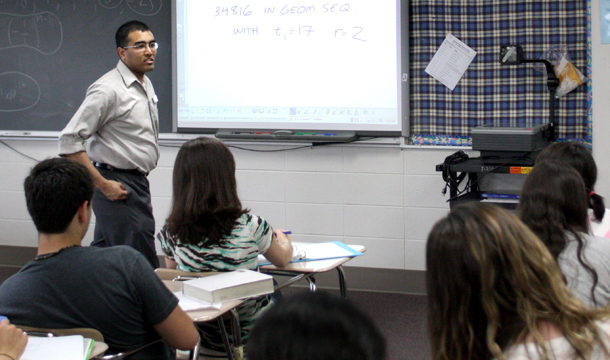 Hemant Mehta, pictured above, teaches a math class at Neuqua Valley High School in Naperville, IL. Public-sector employment fell during our economic recovery, particularly in counties, cities, and towns, where almost two-thirds of public employees work. The largest share of those employees, 55.5 percent to be exact, work in education, mainly as teachers. (AP/Corey R. Minkanic)