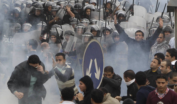 Egyptian antigovernment activists clash with riot police in Cairo, Egypt, Friday, January 28, 2011. (AP/Ben Curtis)