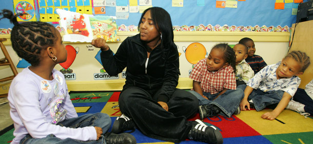 A Head Start teacher reads to a student in Nashville, Tennessee. Head Start provides much-needed educational opportunities for low-income children. It would lose more than $1 billion in funding in the House continuing resolution, forcing serious cutbacks in the availability of their much-needed service. (AP/John Russell)