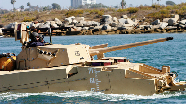 Terminating the expeditionary fighting vehicle, pictured here, and updating the Corps’s current armored amphibious vehicles would save an estimated $9 to $10 billion over the next decade. (AP/Pvt. Daniel Boothe)