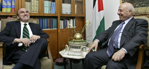 Palestinian Prime Minister Ahmed Qureia, right, meets with U.S. Senior Mideast specialist on the National Security Council Elliott Abrams at Qureia's office in the town of Abu Dis, in the outskirts of Jerusalem on August 5, 2004. In recent weeks, Abrams, now associated with the Council on Foreign Relations, has criticized the president for his insufficient attention to democracy around the world in general and Egypt and Tunisia in particular. (AP/Oded Balilty)
