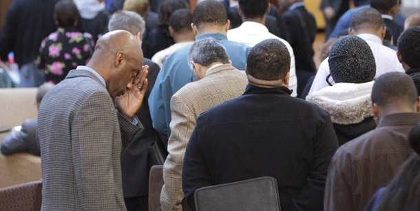 Job seekers line up for a job fair at a hotel in Dallas on January 26, 2011. We all benefit from an unemployment insurance system that can be an effective automatic stabilizer during recessions, especially prolonged recessions like the one we’re now escaping. (AP/LM Otero)