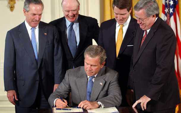 President George W. Bush signs a bill on Wednesday, May 28, 2003, offering $330 billion in tax breaks to families, businesses, and investors. The bill, however, was derided by many economists as an ineffective way to turn the economy around and to bring stronger job growth to American families. And true to this prediction, the years after the bill’s passage were marked with job growth about one-third below its long-term average. (AP/Susan Walsh)