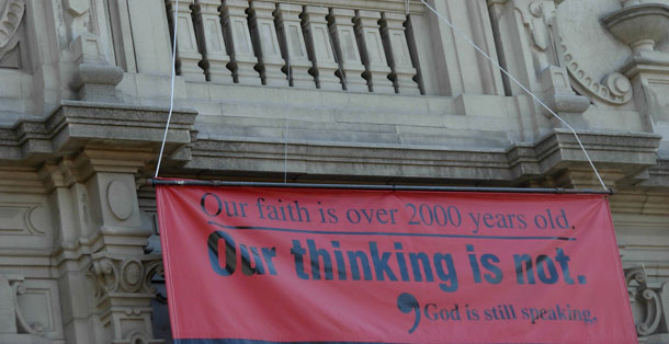 A banner on a church balcony in Riverside, California. Many faith communities are working hard to welcome gay, lesbian, bi-sexual, and transgender people into their congregations and stand up for LGBT moral equality. (Flickr/rococohobo)