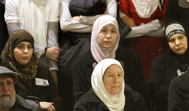 Muslim Americans and supporters rally in the rotunda of the Illinois State Capitol during Illinois Muslim Action Day in Springfield, Wednesday, March 9, 2011. (AP/Seth Perlman)