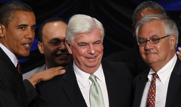 President Barack Obama, left, stands with Sen. Chris Dodd (D-CT), center, and Rep. Barney Frank (D-MA), right, after he signed the Dodd-Frank Wall Street Reform and Consumer Protection financial reform bill at the Ronald Reagan Building in Washington, Wednesday, July 21, 2010. (AP/Charles Dharapak)