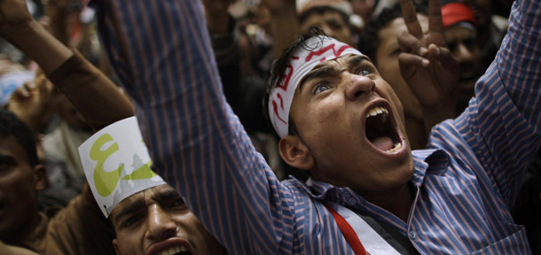 Antigovernment protesters shout slogans during a demonstration demanding the resignation of Yemeni President Ali Abdullah Saleh, in Sanaa, Yemen, on March 27, 2011. (AP/Muhammed Muheisen)