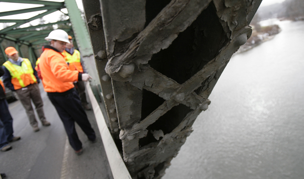 Neale Lunderville, former secretary of the Vermont Agency of Transportation, points to critical areas on a failing bridge in Middlesex, Vermont. It’s heartening that plans to repair our infrastructure even made it on to the House leadership’s “to do” list. But it’s frightening that with 72,000 bridges in urgent need of repair, the best idea on the table is grounded in fantasy. (AP/Toby Talbot)