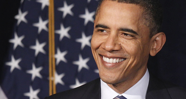 President Barack Obama smiles at George Washington University in Washington, Wednesday, April 13, 2011, prior to delivering a speech on fiscal policy. (AP/Charles Dharapak)