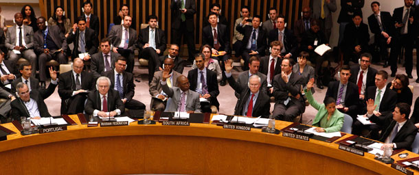 Russia, second left, abstains as member states vote to approve a  resolution that will impose a no-fly zone over Libya during a meeting of  the United Nations Security Council at U.N. headquarters on March  17, 2011. (AP/Jason DeCrow)
