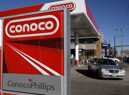 A Conoco Phillips gas station is seen in Denver. The company devoted $1.6 billion of its $3 billion first-quarter earnings to stock buybacks—more than 50 percent of its profits. (AP/David Zalubowski)
