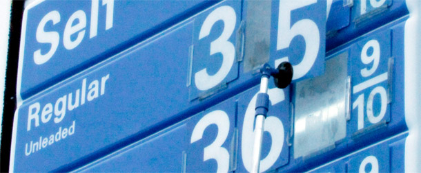 Gas prices are seen on a sign at an Exxon station. Families are in for another summer of high gas prices with no end in sight. (AP Photo/Keith Srakocic)