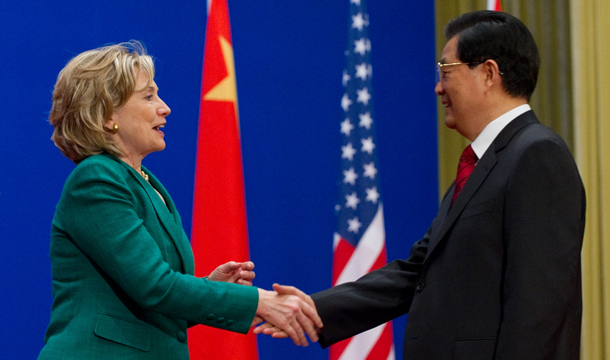 U.S. Secretary of State Hillary Clinton, left, shakes hands with Chinese President Hu Jintao during the opening ceremony of last year's U.S.-China Strategic and Economic Dialogue in Beijing, Monday, May 24, 2010. (AP/Saul Loeb)