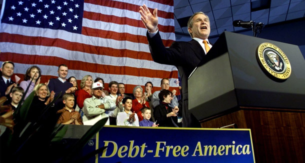 President George W. Bush is welcomed to Omaha, Nebraska, on February 28, 2001, during a five-state tour to promote his budget agenda and tax cuts. (AP/J. Scott Applewhite)