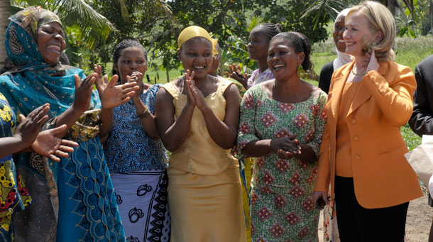 U.S. Secretary of State Hillary Rodham Clinton meets with the farmers in the Upendo Women's Cooperative group in Mlandizi, Tanzania. (AP/Susan Walsh)