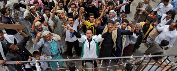Antigovernment protesters chant slogans during a demonstration demanding the resignation of Yemeni President Ali Abdullah Saleh in Sana'a, Yemen, June 13, 2011. The Obama administration has decided to move CIA drones into Yemen due to concern that Al Qaeda is taking advantage of the country's political crisis. (AP/Hani Mohammed)