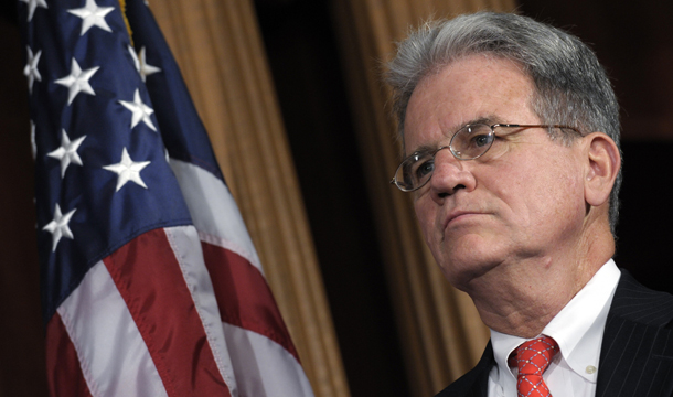 Sen. Tom Coburn (R-OK) listens during a news conference on the debt ceiling on Capitol Hill in Washington, Thursday, July 21, 2011. Both Democrats and Republicans believe Congress should base future budget cuts on an evaluation of what works, not just what’s politically palatable. Coburn claims that approach is the cornerstone of his $9 trillion debt reduction plan released last week. (AP/Susan Walsh)