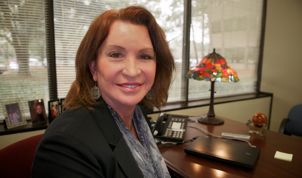 Gina Duncan, a transgender employee, sits at her Wells Fargo office in Maitland, Florida. Transgender workers face especially high rates of employment  discrimination and harassment on the job. In a recent national survey,  an astonishing 90 percent of transgender people reported some form of  harassment or mistreatment on the job. (AP/Roberto Gonzalez)