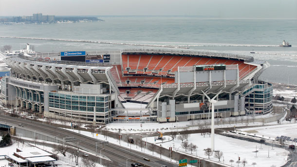 With Lake Erie in the background, a wind turbine that provides energy for the neighboring Great Lakes Science Center, is seen outside Cleveland Browns Stadium in Cleveland. In one of last official acts as governor Ohio Gov. Ted Strickland signed an iron-clad lease option giving the Lake Erie Energy Development Co. exclusive development rights to a portion of the lakebed owned by the state. (AP/Amy Sancetta)