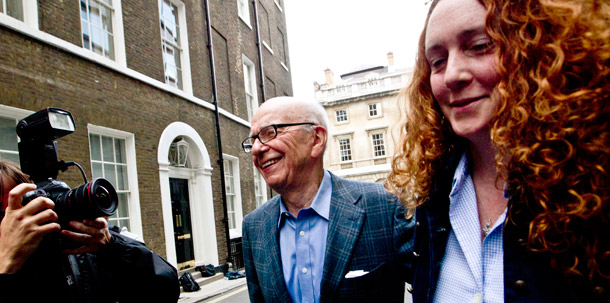 Chairman of News Corporation Rupert Murdoch, left, and Chief Executive  of News International Rebekah Brooks leave Murdoch's residence in central  London on July 10, 2011. (AP/Sang Tan)