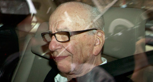 Rupert Murdoch arrives at his residence in central London on July 13, 2011. Not surprisingly, the News Corp. scandal has received little attention on Fox News or in <i>The Wall Street Journal</i>. (AP/Sang Tan)