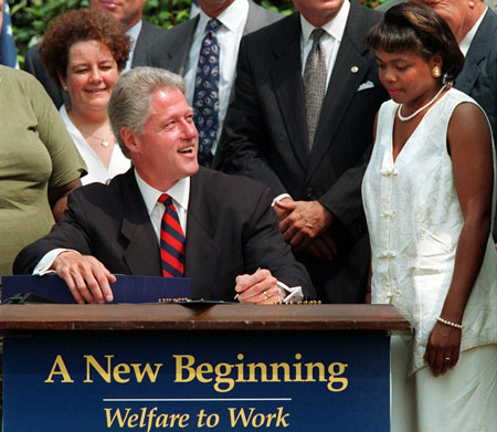 President Clinton prepares to sign legislation in the Rose Garden of the White House Thursday, Aug. 22, 1996, overhauling America's welfare system. (AP/J. Scott Applewhite)