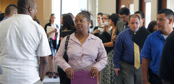 Job seekers line up to see recruiters during a career fair in Plano, Texas, on August 15, 2011. The unemployment rate stood at 9.1 percent in July 2011, making jobs a continued focus for policymakers. (AP/LM Otero)