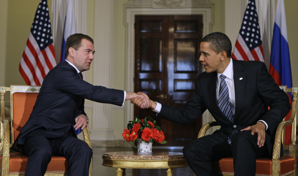 President Barack Obama, right, and Russian President Dmitry Medvedev shake hands during their meeting ahead of the G20 summit in London, Wednesday, April 1, 2009. (AP/Alexander Zemlianichenko)