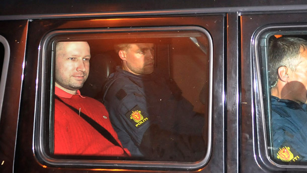 Norway's twin terror attacks suspect Anders Behring Breivik, left, sits  in an armored police vehicle after leaving the courthouse following a  hearing in Oslo on July 25, 2011. <i>The Washington Post</i>'s Ombudsman Patrick B. Pexton recently defended a post by conservative blogger Jennifer Rubin that wrongly attributed the attacks to Muslim extremists. (AP Photo/Aftenposten/Jon-Are Berg-Jacobsen)