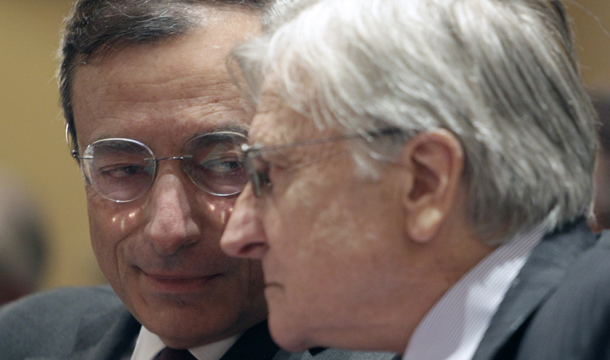 European Central Bank head Jean-Claude Trichet, right, listens to Mario Draghi, next to take the helm of the European Central Bank, during a conference on the debt crisis, Monday, September 5, 2011, in Paris. (AP/Michel Euler)