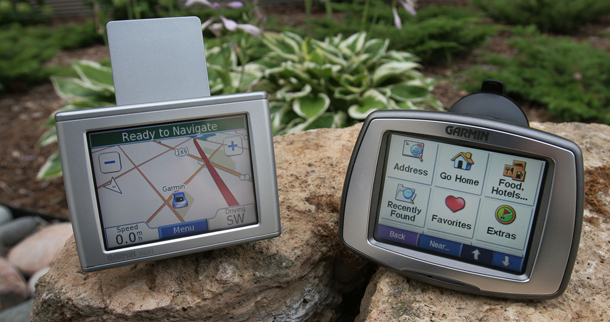Garmin GPS units are shown outside the company's headquarters on Friday, July 7, 2006, in Olathe, Kansas. The Defense Advanced Research Projects Agency has been an innovation hothouse since the 1950s, and is credited with helping to create the Internet and GPS technology. But such exceptions are rare, particularly in the social sphere. (AP/Reed Hoffmann)