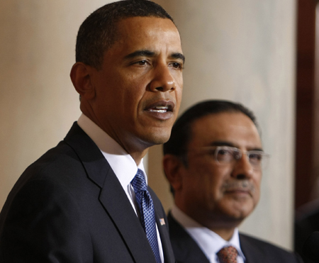 President Barack Obama, accompanied by Pakistani President Asif Ali Zardari, makes a statement in the Grand Foyer of the White House in Washington, Wednesday, May 6, 2009. (AP/Gerald Herbert)