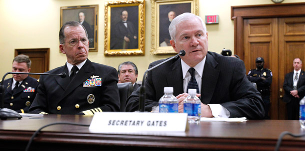 Defense Secretary Robert Gates with Joint Chiefs Chairman Adm. Mike Mullen, left, testifies on Capitol Hill in Washington before the House Appropriations Committee on March 2, 2011, about defense spending. Military health care costs are rapidly rising unchecked, and Secretary Gates says they are simply unsustainable. (AP/Jose Luis Magana)