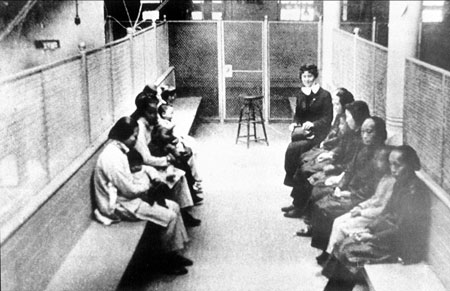A group of Chinese and Japanese women and children in internment barracks during the 1920s. Proponents of the resolution to express regret for the Chinese Exclusion Act of 1882 want the government to officially acknowledge that the law was unjust. (AP/File)