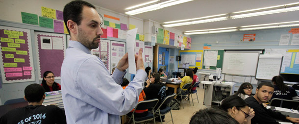 A teacher leads a global history class in New York City. The next version of the Elementary and Secondary Education Act should authorize competitive innovation grants  to improve the effectiveness of school personnel already in the  classroom, as well as those currently being trained. (AP/Richard Drew)