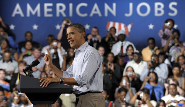 President Barack Obama speaks at Greensville County High School in Emporia, Virginia, Tuesday, October 18, 2011, promoting the American Jobs Act. Enacting the act will help the economy grow faster. (AP/Susan Walsh)