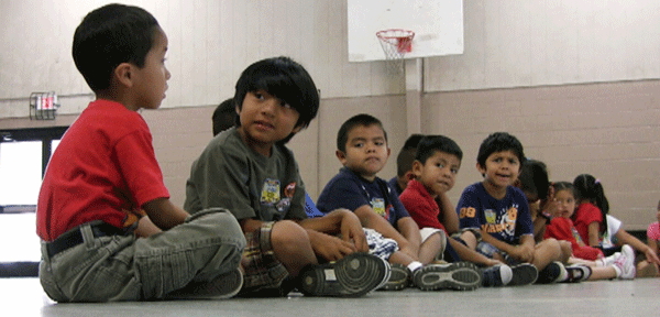 Students sit in the gym at Crossville Elmentary School in Crossville, Alabama. Despite being in an almost all-white town, the school's enrollment is about 65 percent Hispanic. (AP/Jay Reeves)