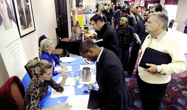 Job seekers attend the Minneapolis Career Fair held Wednesday, November 2, 2011, in Bloomington, Minnesota. (AP/Jim Mone)