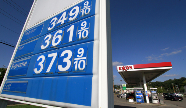 In this September 27, 2011 photo, cars line up at the pumps at an Exxon mini-mart in Carnegie, Pennsylvania. High gas prices are bad for consumers but great for Big Oil, which pulled in a staggering $101 billion in profits during the first nine months of 2011. (AP/Gene J. Puskar)