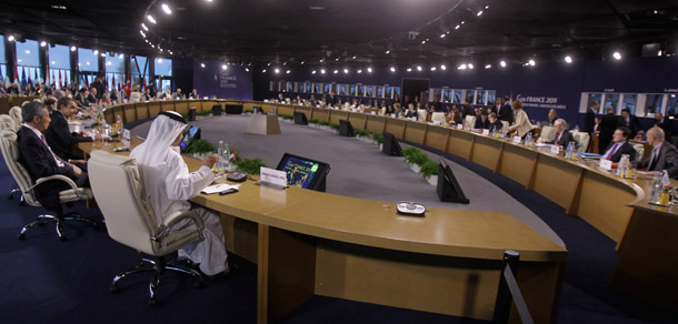 World leaders gather at the G-20 meeting in Cannes, France, on November 3, 2011. On the leaders' agenda should be climate financing to lessen the increasingly costly effects of global warming. (AP/Michel Euler)