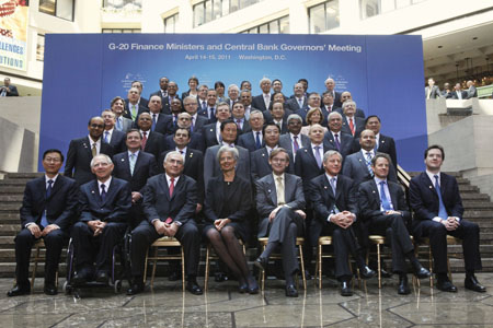 Delegates of the G-20 pose for a group photograph at the World Bank/IMF Spring Meetings 2011 in Washington, Friday, April 15, 2011. (AP/Jacquelyn Martin)