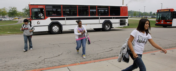 Students arrive at the campus of Northern Illinois University in DeKalb, Illinois. Congress is battling over Pell Grant funding, with the House and Senate taking different approaches. (AP/M. Spencer Green)