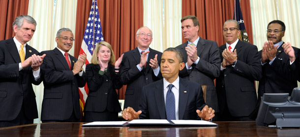 President Barack Obama finishes signing a proclamation designating Fort  Monroe as a national monument on November 1, 2011, in the Oval Office  of the White House in Washington. (AP/Susan Walsh)