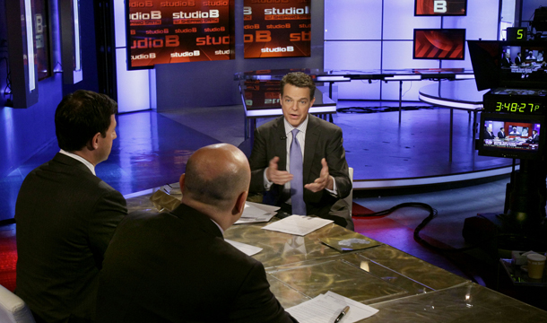 Fox News Channel anchor Shepard Smith, background right, conducts an interview during his "Studio B" program in New York, Tuesday, May 24, 2011. (AP/Richard Drew)