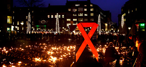 Candles are lit for Danish victims of HIV/AIDS to mark World AIDS Day at Nytorv, Copenhagen, on December 1, 2011. (AP/Polfoto, Martin Bubandt)