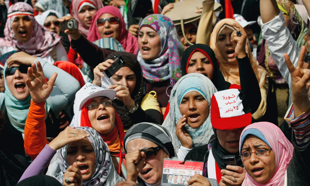 Egyptian women chant slogans as they attend a demonstration in Tahrir Square in Cairo, Egypt on April 1, 2011. Women throughout the region have played crucial roles in the Arab Spring uprisings, but have also been subject to high levels of sexual violence and rape. (AP/ Khalil Hamra)