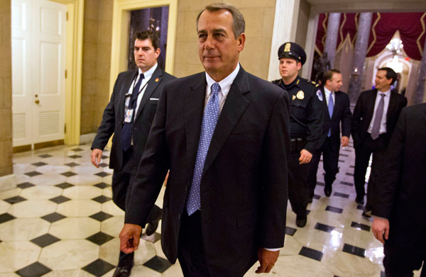 House Speaker John Boehner of Ohio walks off the floor of the House chamber on December 20, 2011, in Washington. The House rejected bi-partisan legislation passed by the Senate that would have extended a payroll tax cut and jobless benefits for two months. (AP/Evan Vucci)