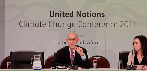 U.S. lead negotiator Todd Stern, center, speaks during the climate  change conference taking place in the city of Durban, South Africa. (AP/Schalk van Zuydam)